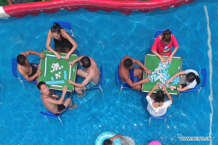 China's Chongqing issues orange alert for high temperatures