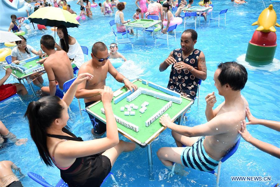 China's Chongqing issues orange alert for high temperatures