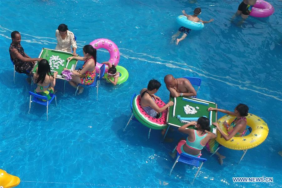 China's Chongqing issues orange alert for high temperatures