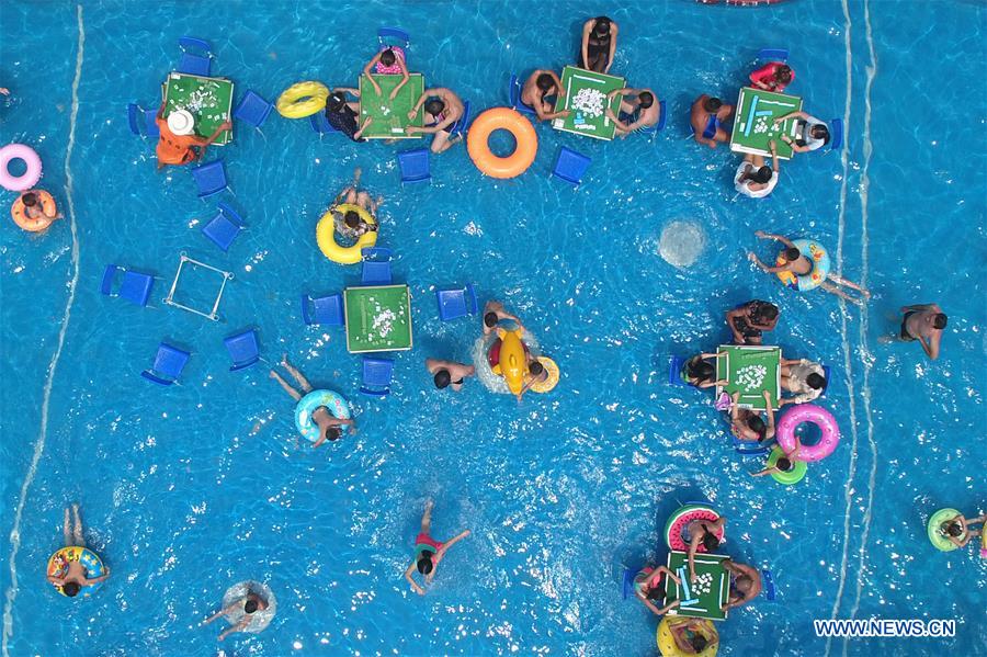 China's Chongqing issues orange alert for high temperatures