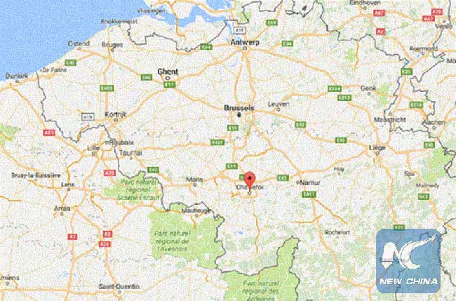 Two Belgian police wounded by man shouting 