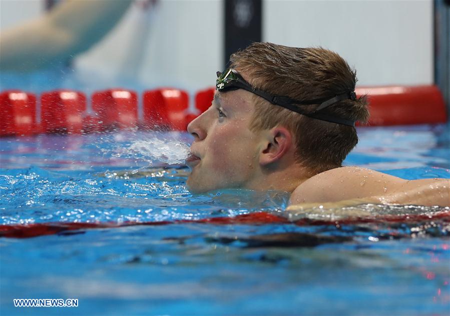 Adam Peaty breaks world record of men's 100m breaststroke swimming