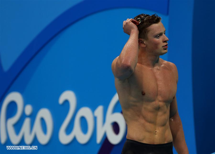 Adam Peaty breaks world record of men's 100m breaststroke swimming