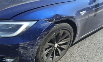 Tesla's 1st crash in China puts self-driving in spotlight