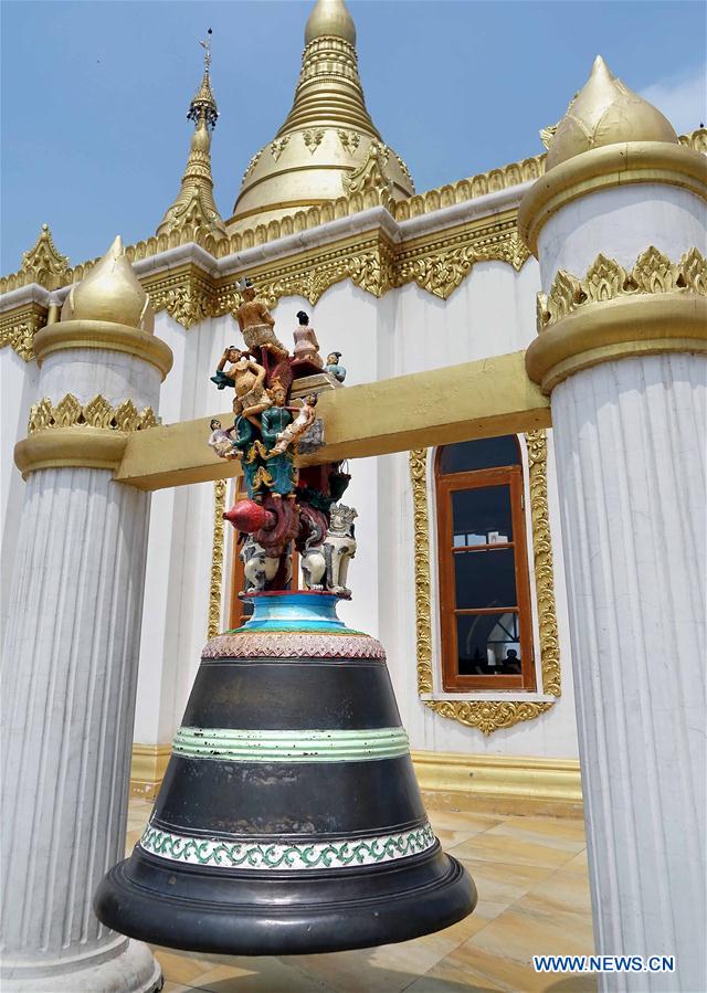 People visit Myanmar style shrine in C China's Henan