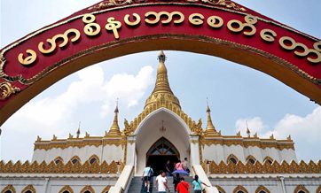 People visit Myanmar style shrine in C China's Henan