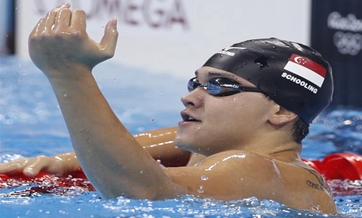 Schooling stuns Phelps for Singapore's first Olympic gold