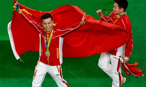 China's Dong and Gao take silver, bronze in men's trampoline