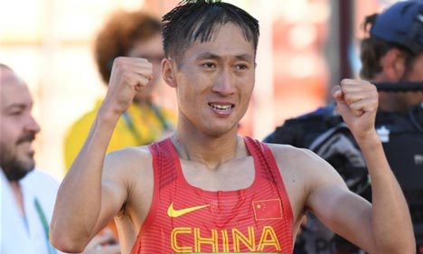 Wang Zhen wins men's 20km race walk gold