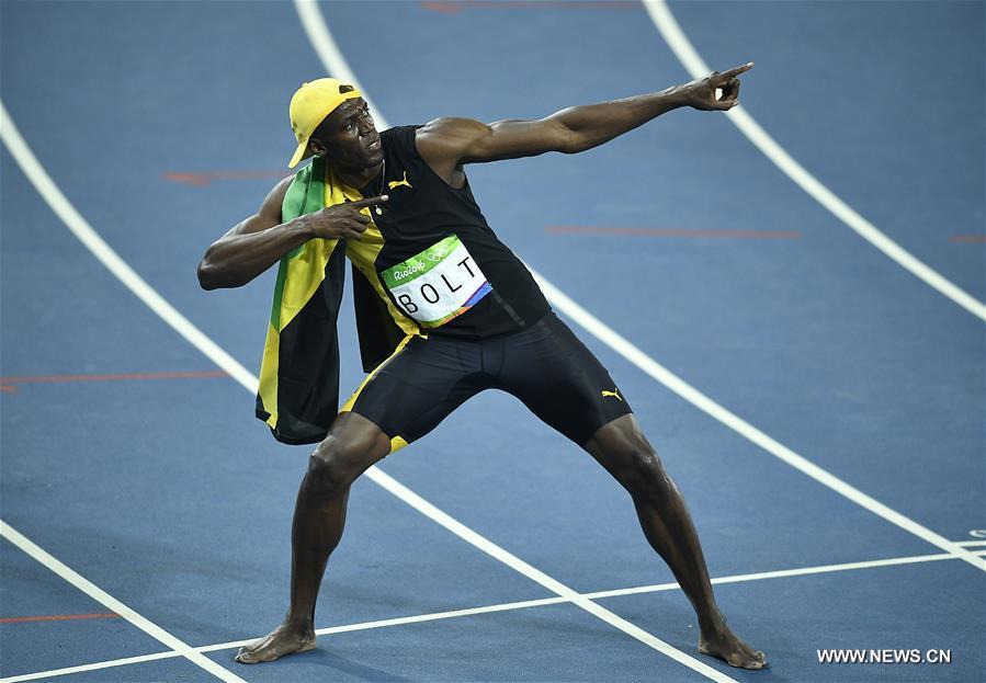 Bolt wins third Olympic men's 100m title