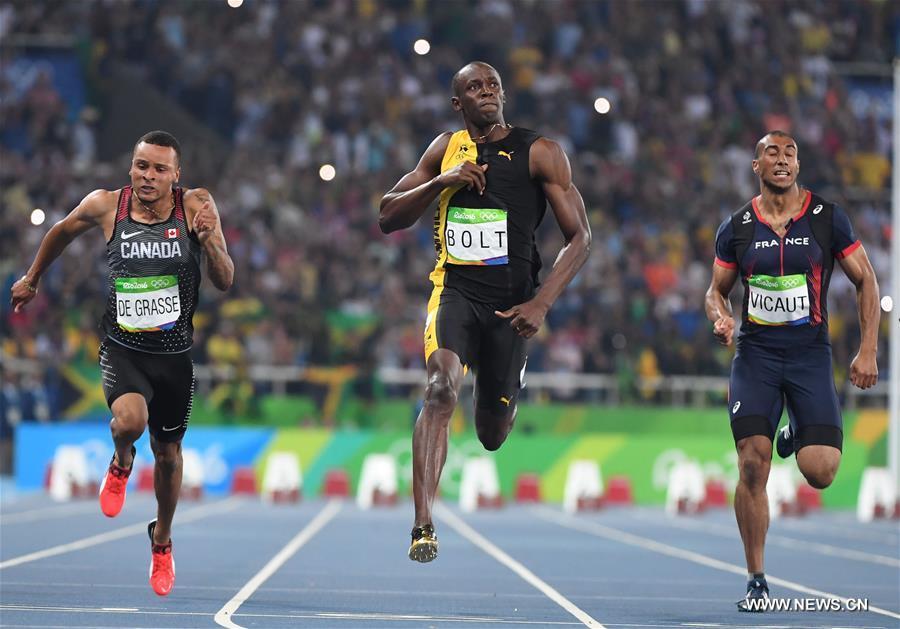 Bolt wins third Olympic men's 100m title