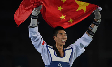China wins two Olympic golds in taekwondo and table tennis
