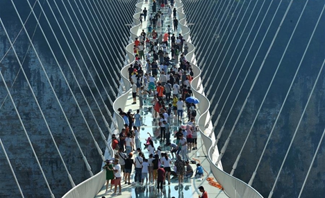 Zhangjiajie Grand Canyon's glass-bottom bridge opens to tourists