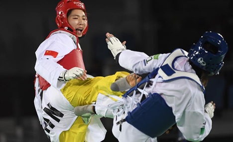 China's Zheng Shuyin wins gold medal of women's +67kg taekwondo