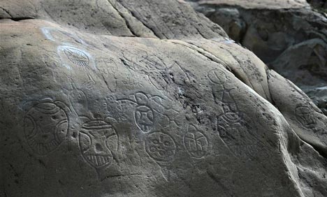 Cliff painting scenic spot of Helan Mountain damaged due to flood