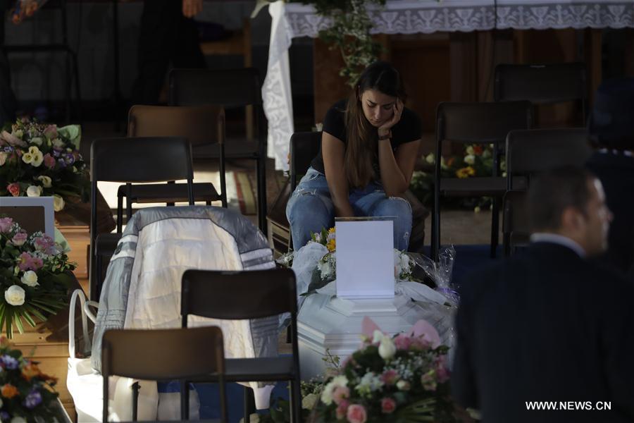 Relatives mourn for earthquake victims in Italy
