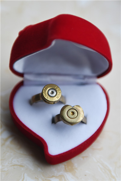 Couples exchanges 'bullet shell rings 