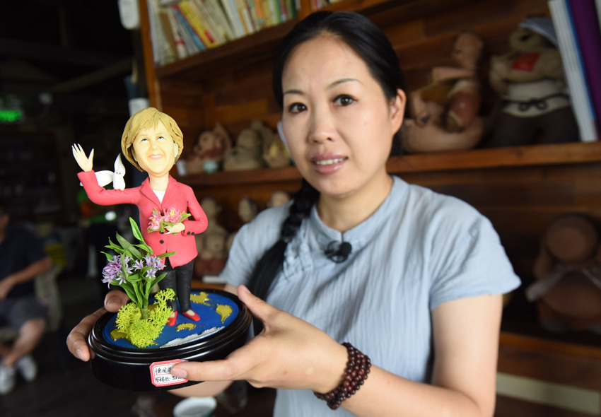 Hangzhou artist crafts figures of G20 leaders from rice