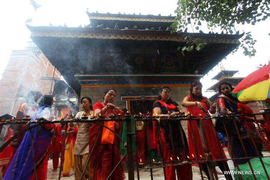 Women offer prayers during Teej festival in Kathmandu
