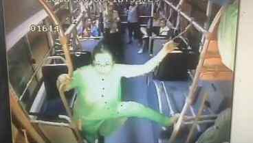 Middle-aged woman performs 'pole dance' on bus
