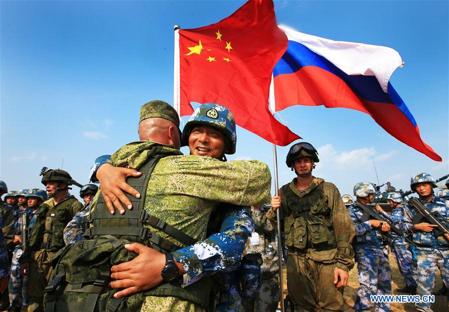 Chinese, Russian navies depart for joint drill at sea