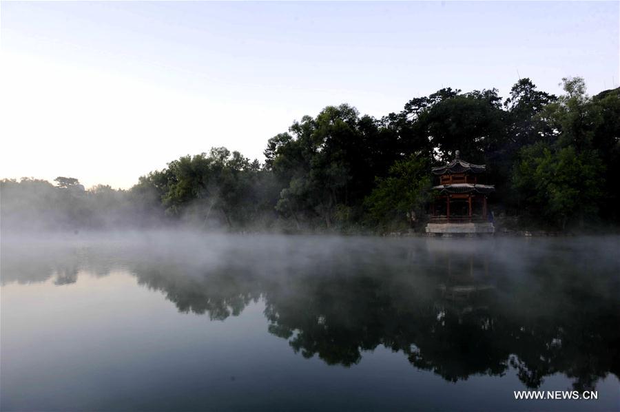 Photo taken on Sept. 20, 2016 shows the fog scenery at the Imperial Mountain Summer Resort in Chengde, north China's Hebei Province.