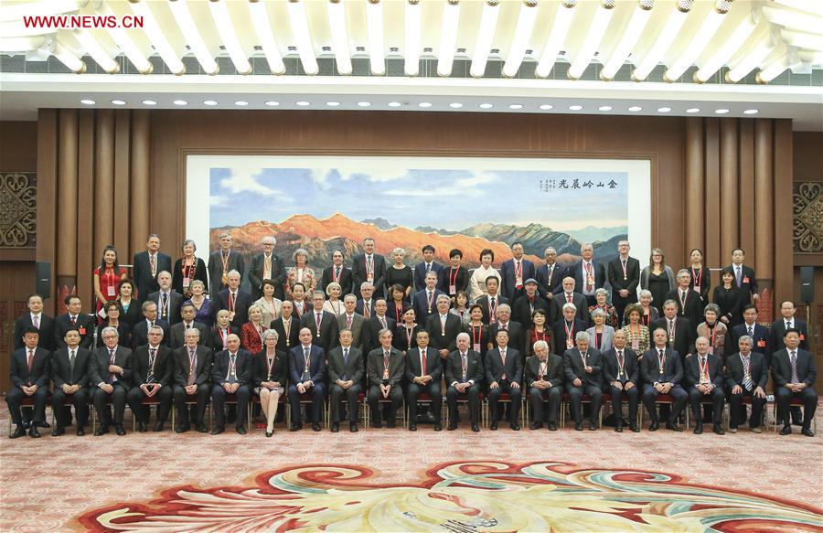 Chinese premier pledges more open policy for foreign talent