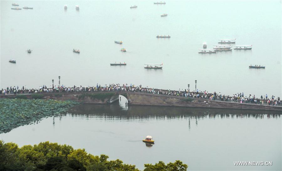 Hangzhou is expected to receive about 15 million tourists during the week-long National Day holiday that starts on Saturday. 