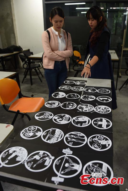 Paper silhouette works honor China's Olympic idols