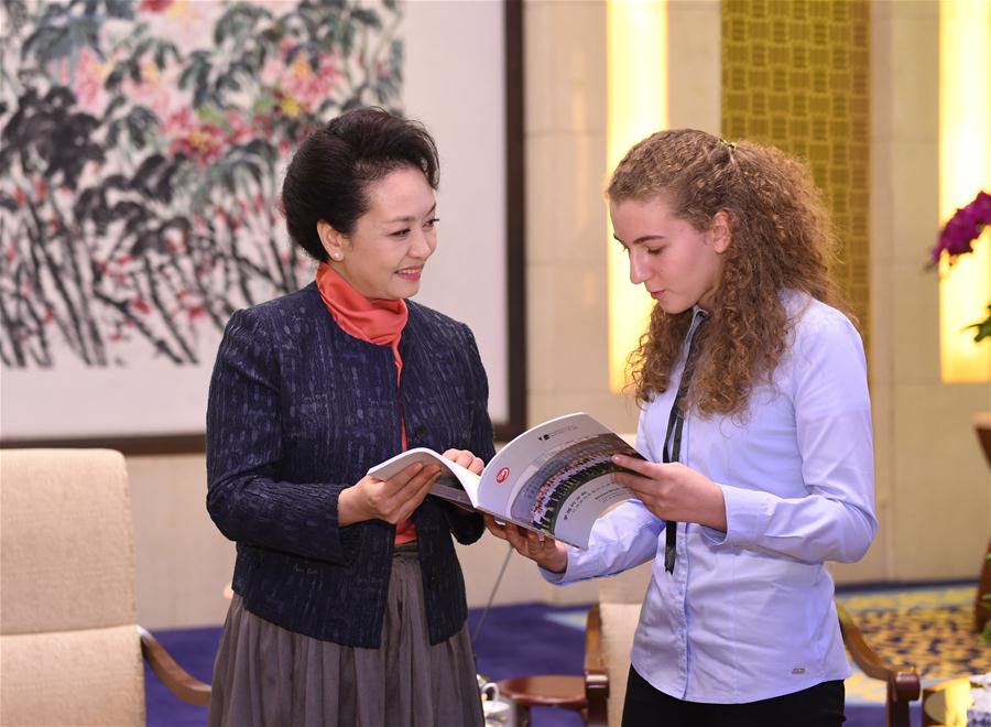 Xi's wife meets German students, teachers