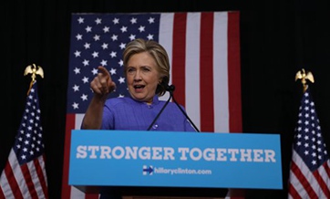 U.S. Justice Dept. to prioritize email probe as Clinton's support dents