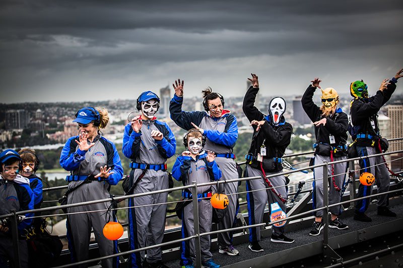 Kids from charity group dance the Monster Mash on the Sydney Harbour Bridge for Halloween