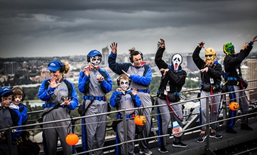 Kids from charity group dance the Monster Mash on the Sydney Harbour Bridge for Halloween