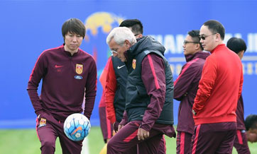 China's national soccer team takes training session in Kunming