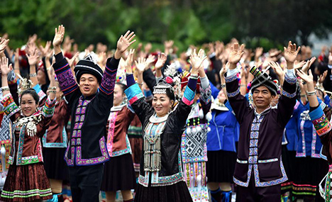 People take part in Kam Grand Choir in Guangxi
