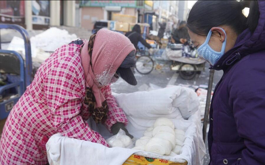 Merchants operate 'business as usual' in frozen Heilongjiang