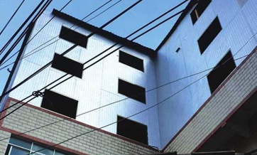 Villagers build 'paper houses' in scheme to receive demolition compensation