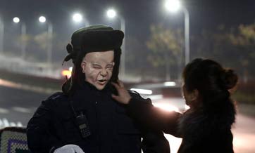 Cemetery in central China deploys creepy robot guard to escort female patrol guards at night