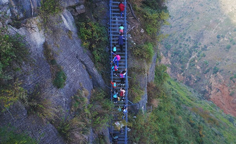 'Ladders of heaven' gives new path to cliff village