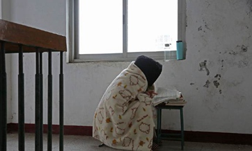 Diligent college students bundle up to prepare for post-graduate exam