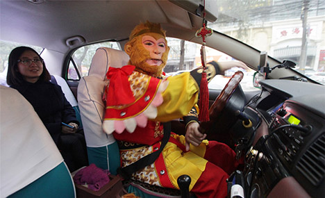 Taxi driver taking Monkey King from screen to streets