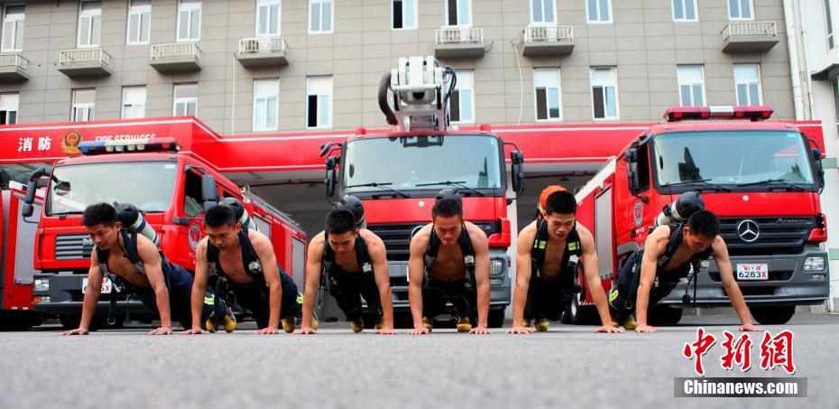 Retiring firefighters show off impressive physique