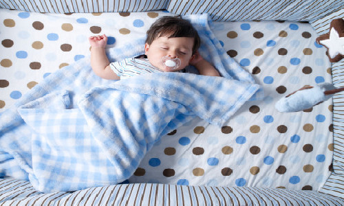 Infant dies in sleep due to excessive bedding