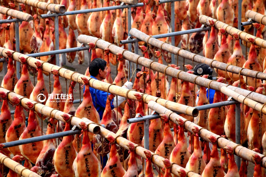 Thousands of Jinhua hams hang in sun