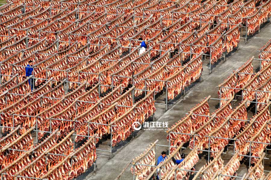 Thousands of Jinhua hams hang in sun