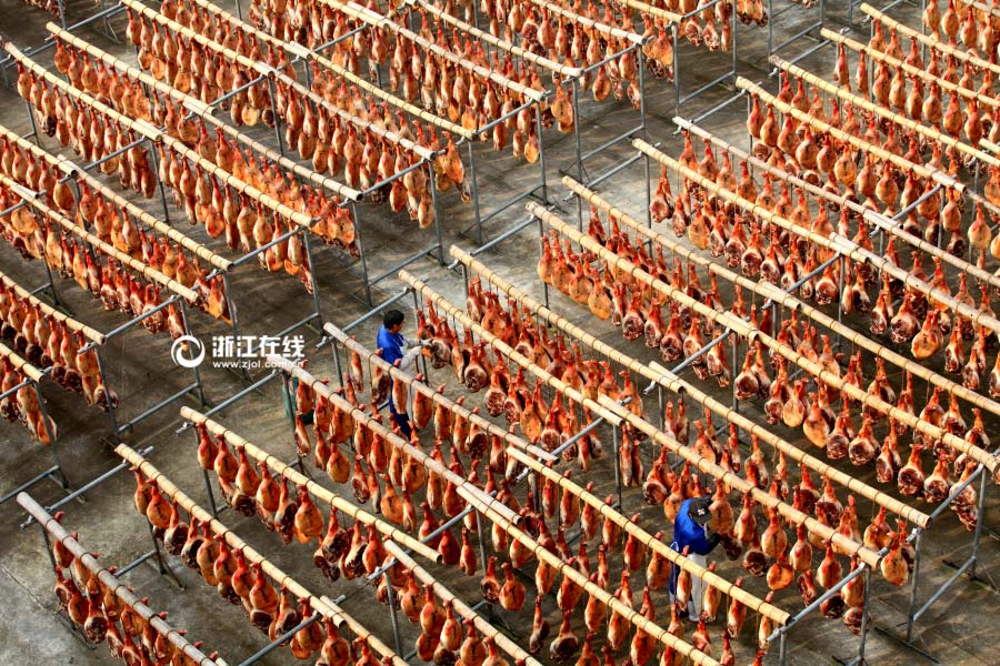Thousands of Jinhua hams hang in sun