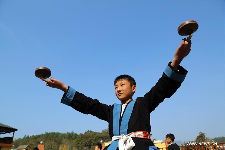 The White Pants Yao, or Baiku Yao in Chinese, is a branch of the Yao ethnic group in southwest China. Playing the whipping top is a popular game for them during festival times.