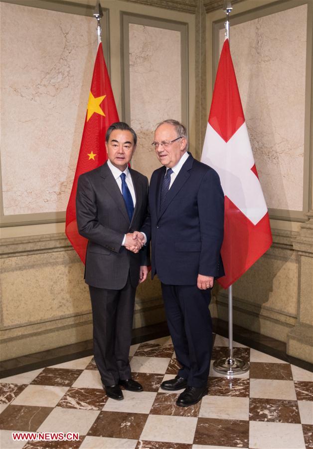 Switzerland, China should jointly voice opposition to protectionism: Chinese FM