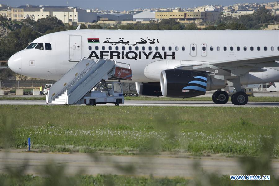 Libyan airplane hijackers surrender, release all hostages