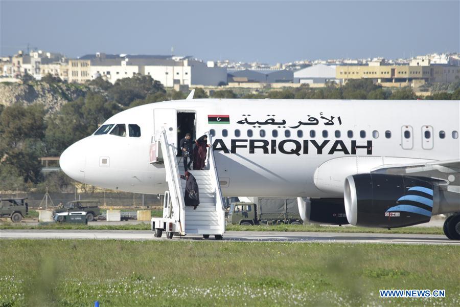 Libyan airplane hijackers surrender, release all hostages